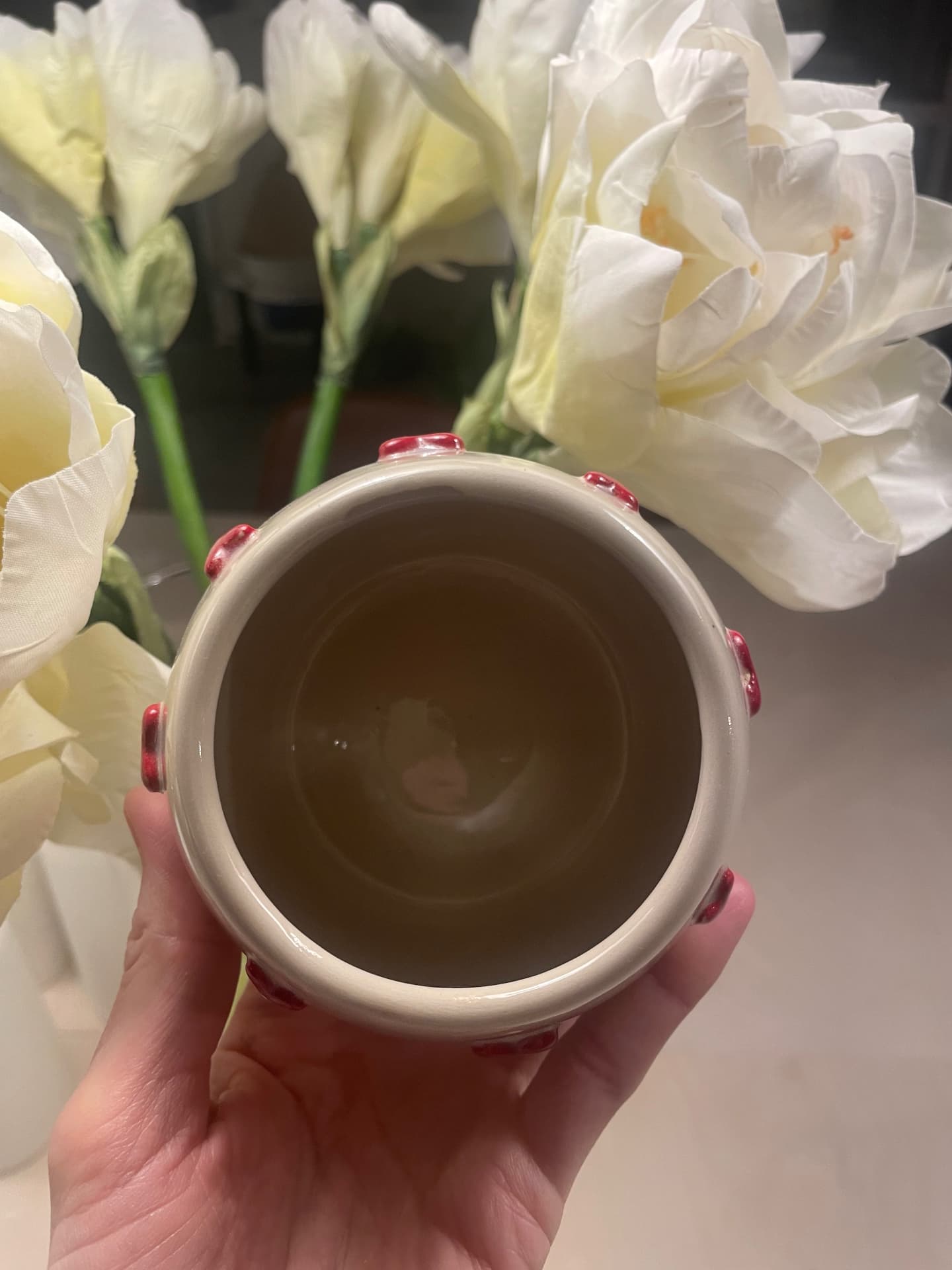 Cream cup interior showing hand-finished glaze