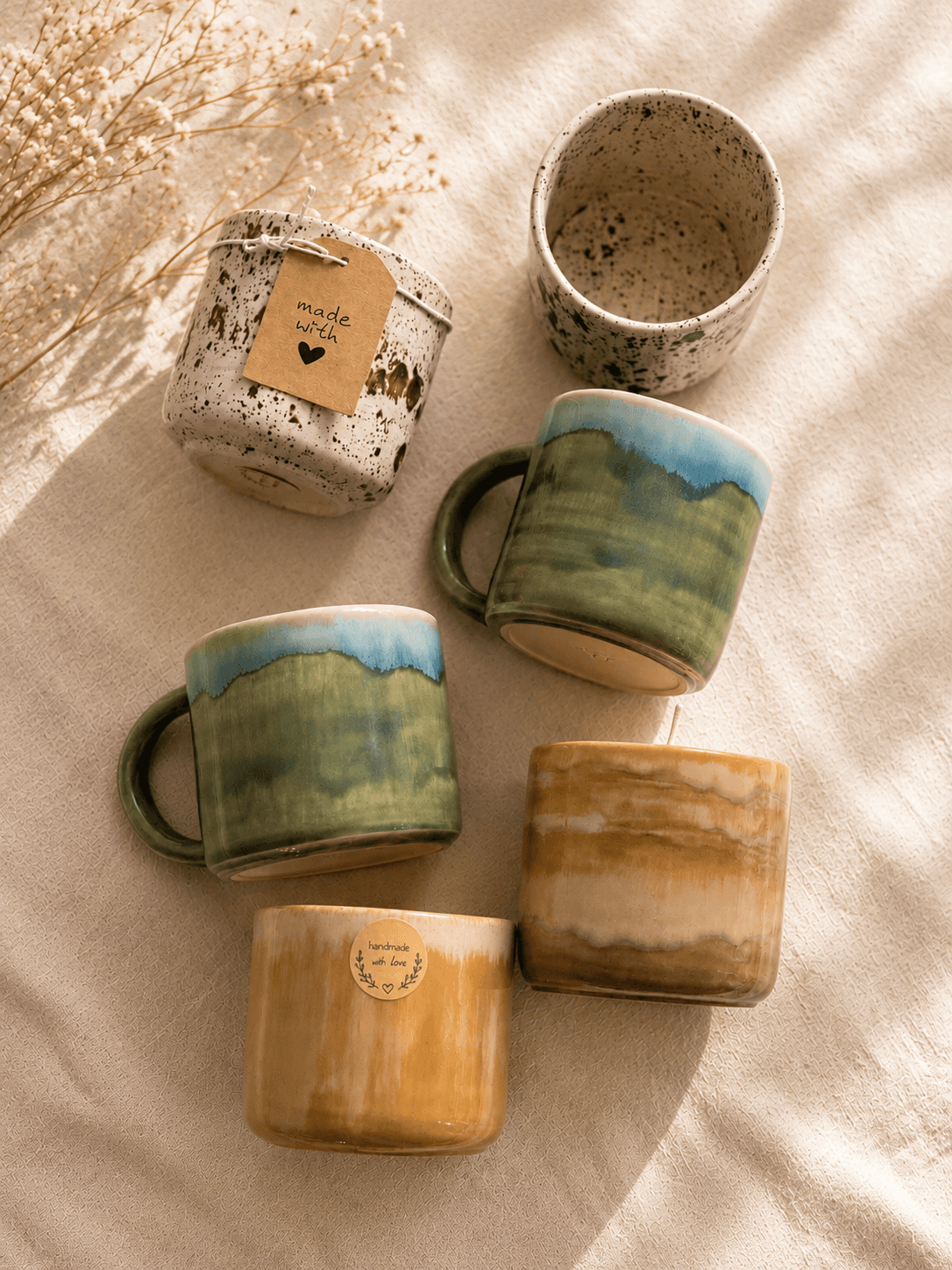 Selection of handmade ceramic mugs from the collection
